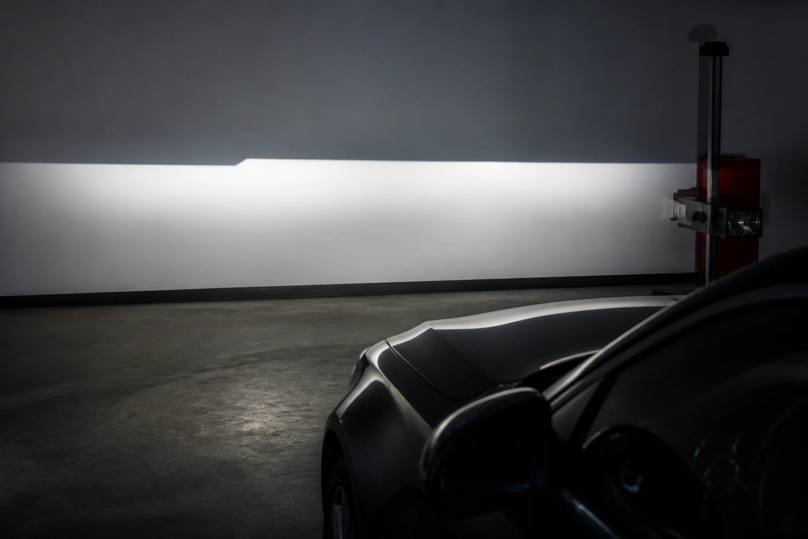 Sharp cut-off beam pattern from a professionally retrofitted bi-LED projector
