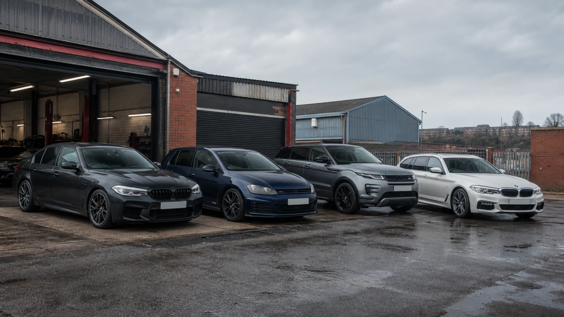 Line-up of tuned and secured customer cars outside the Navs HID Direct workshop
